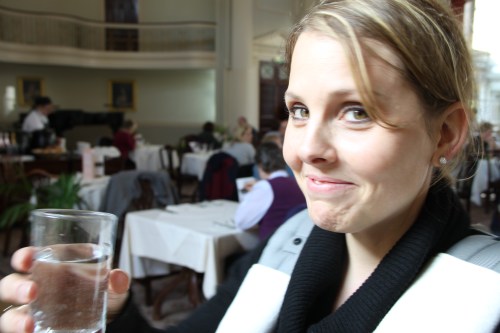 Lana tastes the water at Bath.