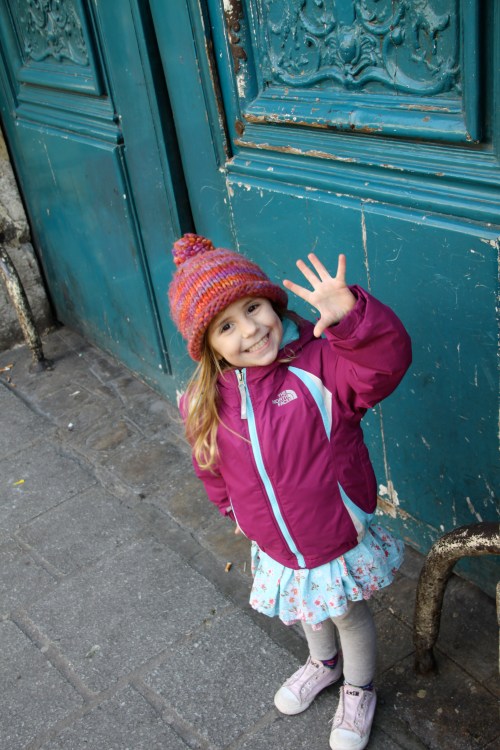 Finley Against a Turquoise Door in the Marais